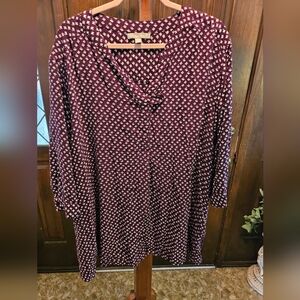 Woman Within Eggplant and White Patterned Top